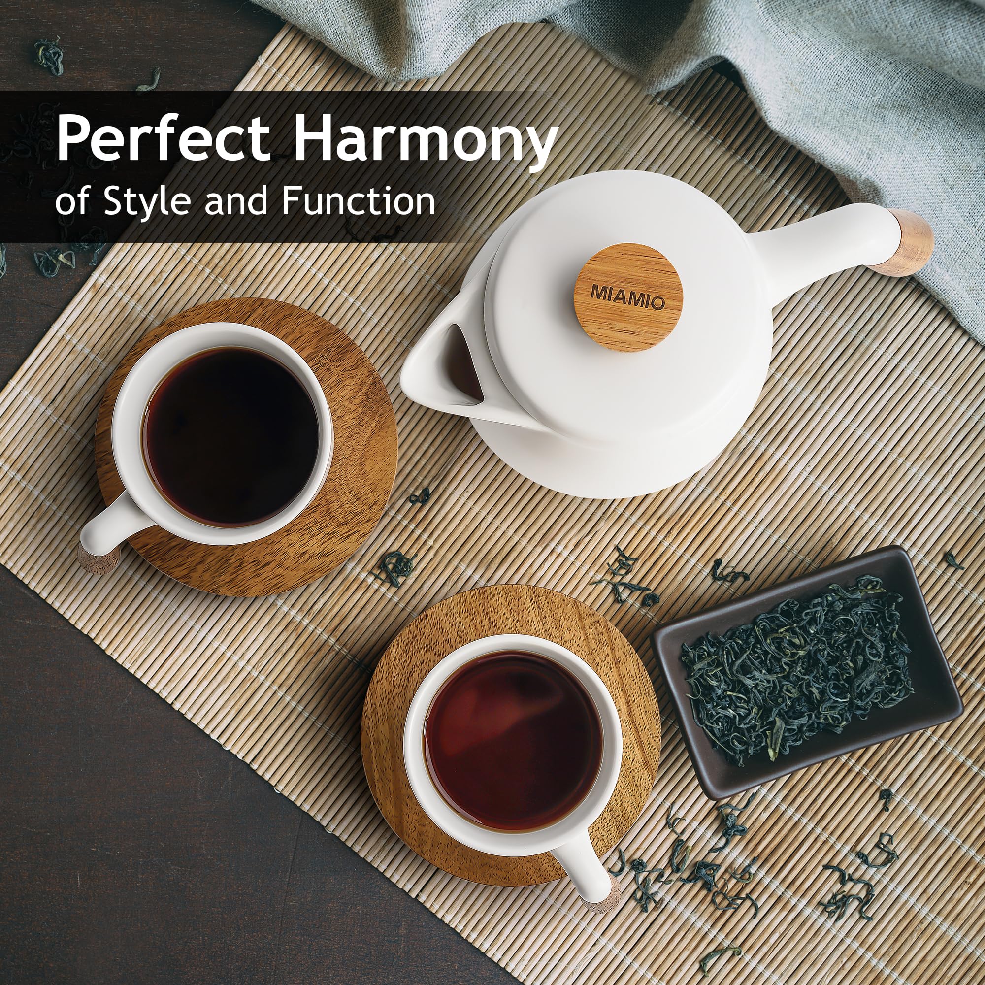 MIAMIO white ceramic teapot features a smooth pour.