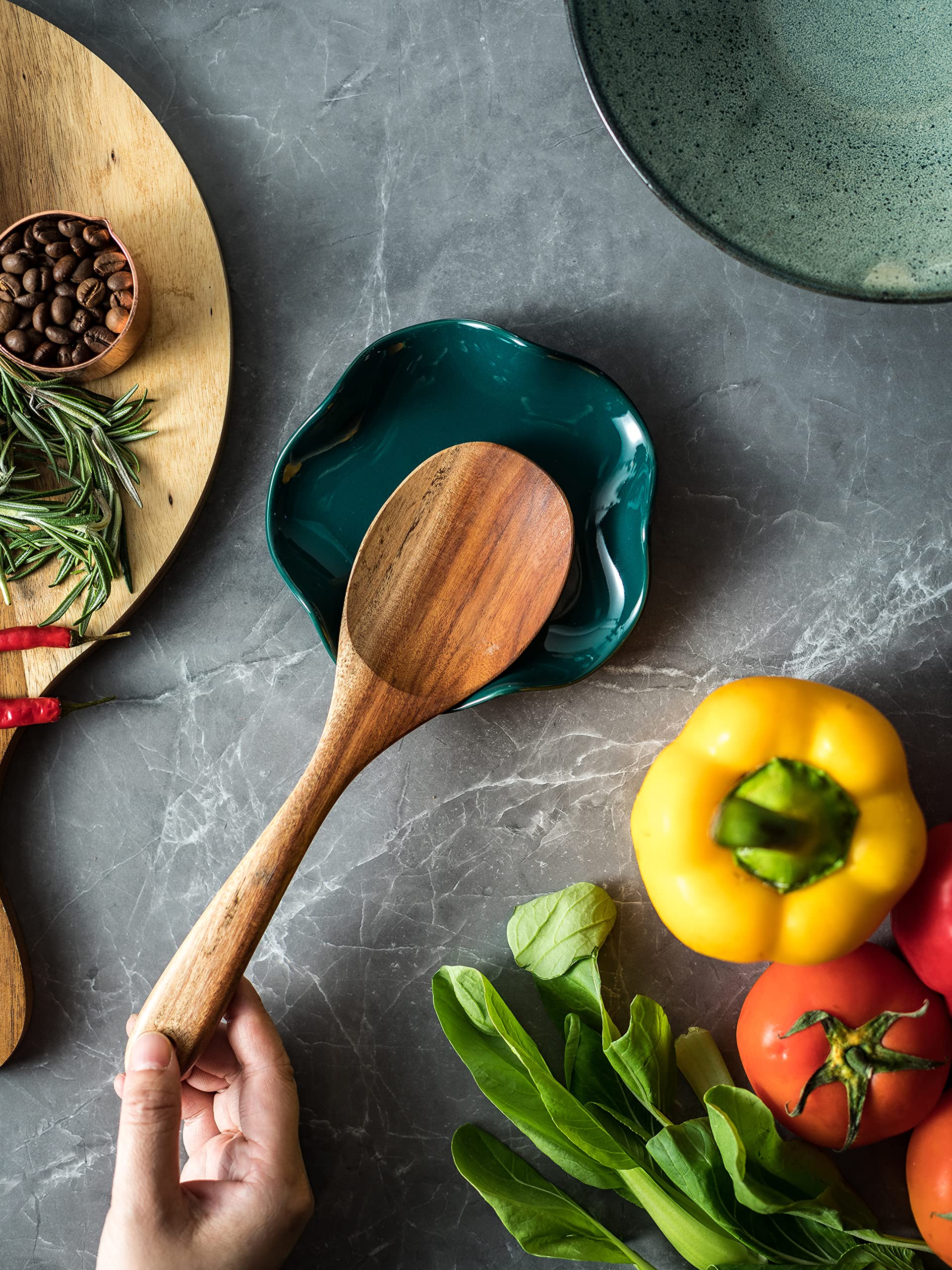 Miamolo spoon rest complements modern kitchen decor while protecting tabletops.