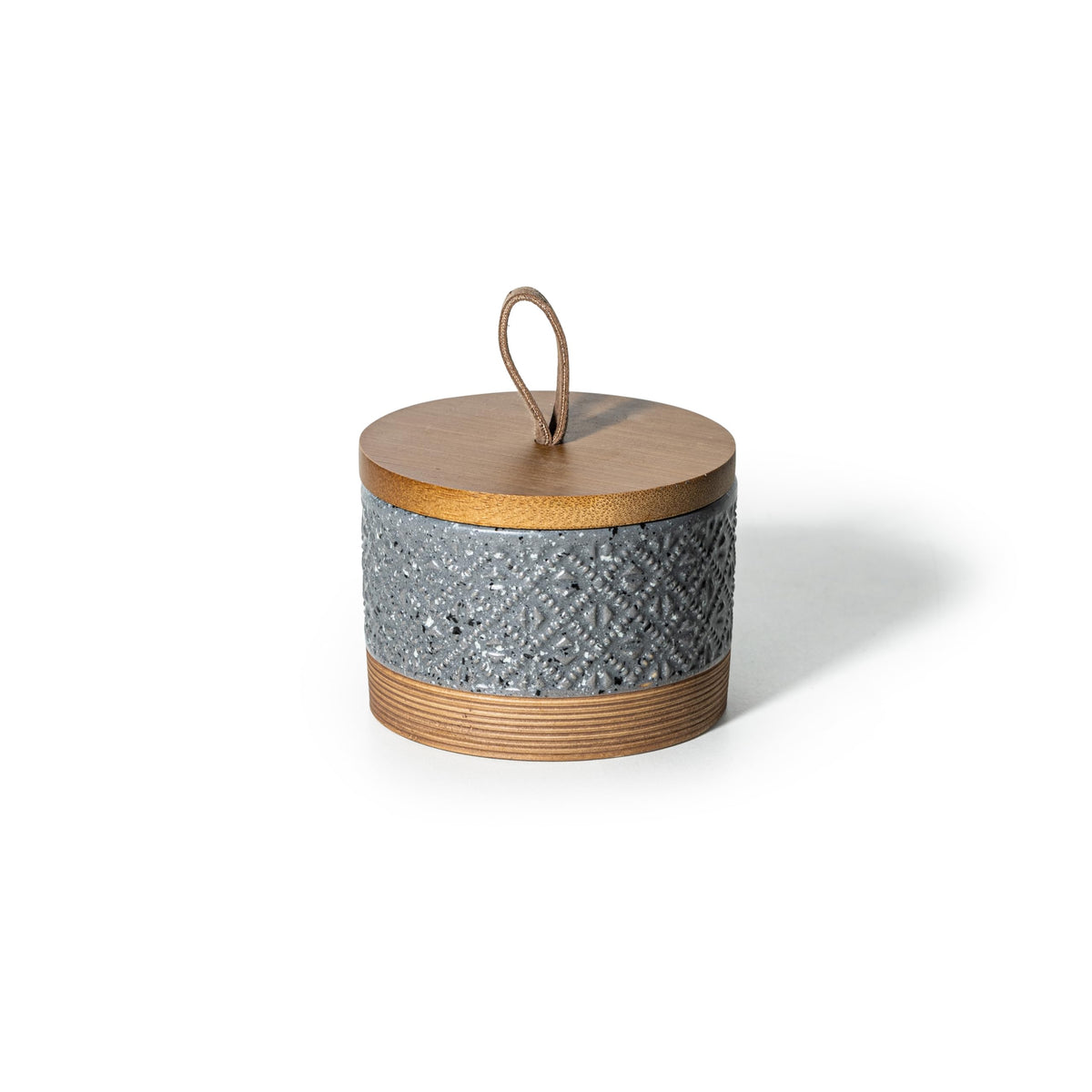 Miamolo small ceramic jar with lid on display, ideal for spice or sugar storage.