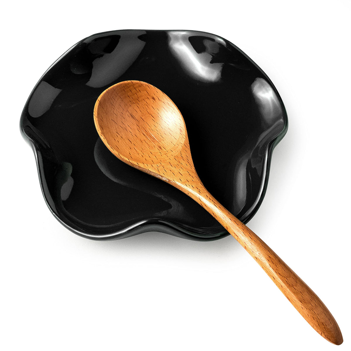 Miamolo spoon rest with black flower design keeps counter tidy and drip-free.