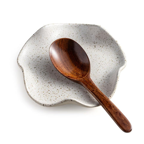 Miamolo spoon rest with speckled floral design keeps counters tidy while cooking