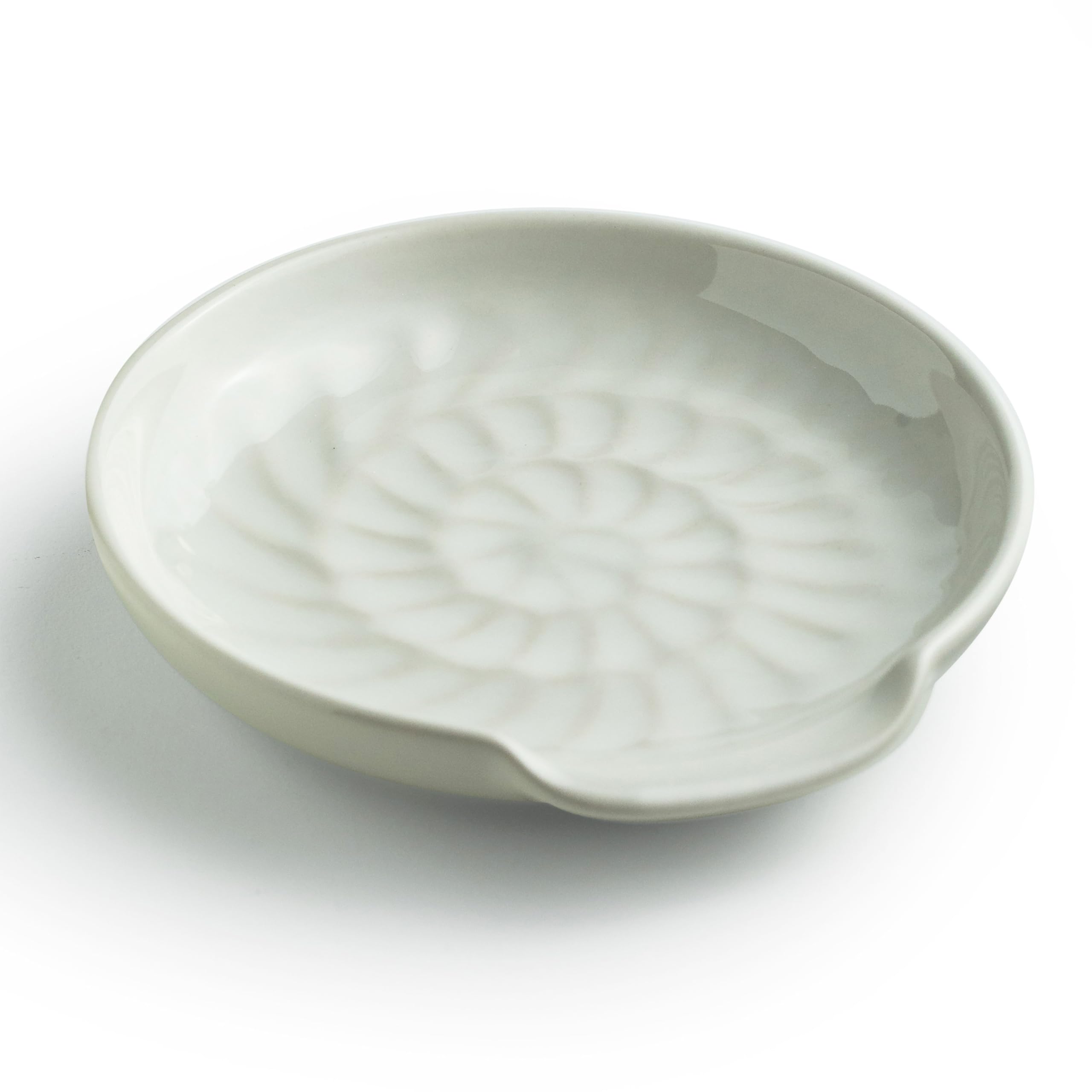 Miamolo spoon rest on stove top, white ceramic keeps counters tidy