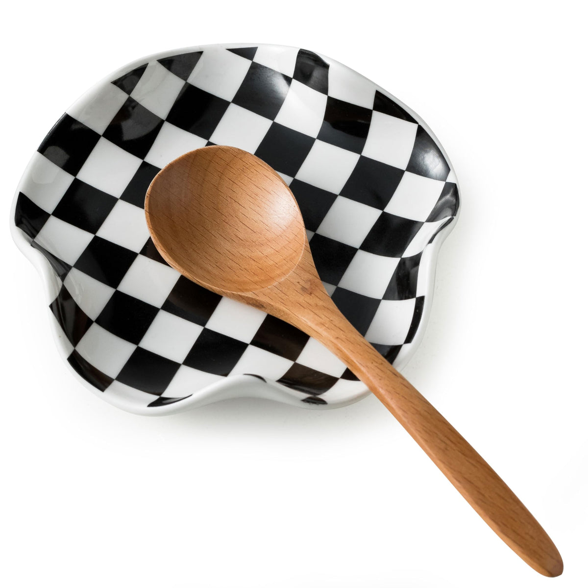 Miamolo spoon rest on stove top provides a stable, easy-to-clean surface during meal prep.