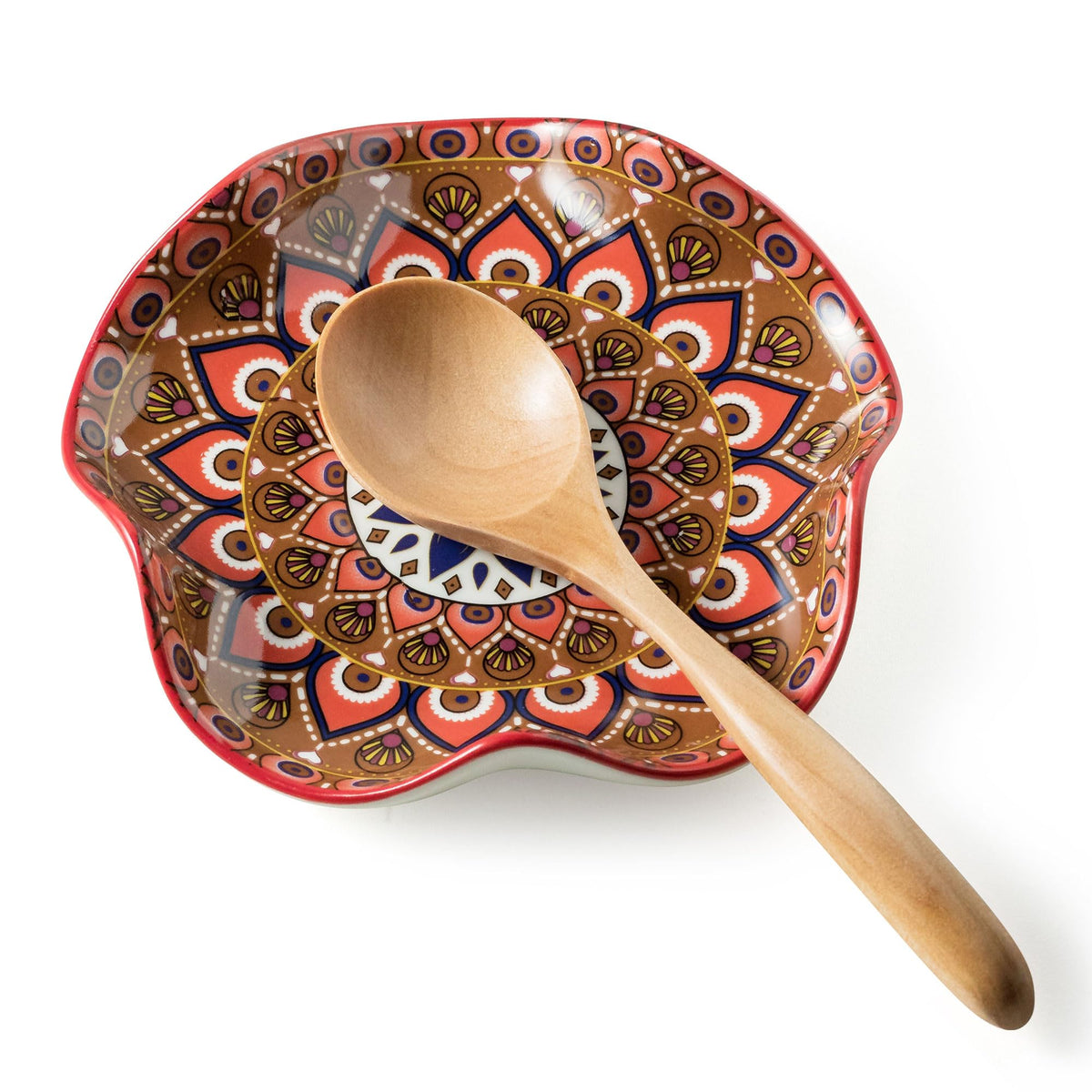 Miamolo spoon rest on stove top with Bohemian pattern, prevents drips and keeps utensils organized.