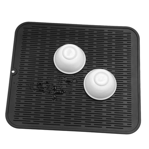 MicoYang dish drying mat beside utensils, absorbs moisture efficiently.