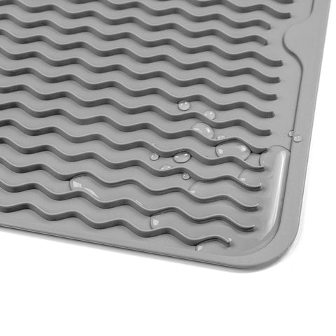 MicoYang multi-use silicone mat serves as sink, counter, and drawer liner