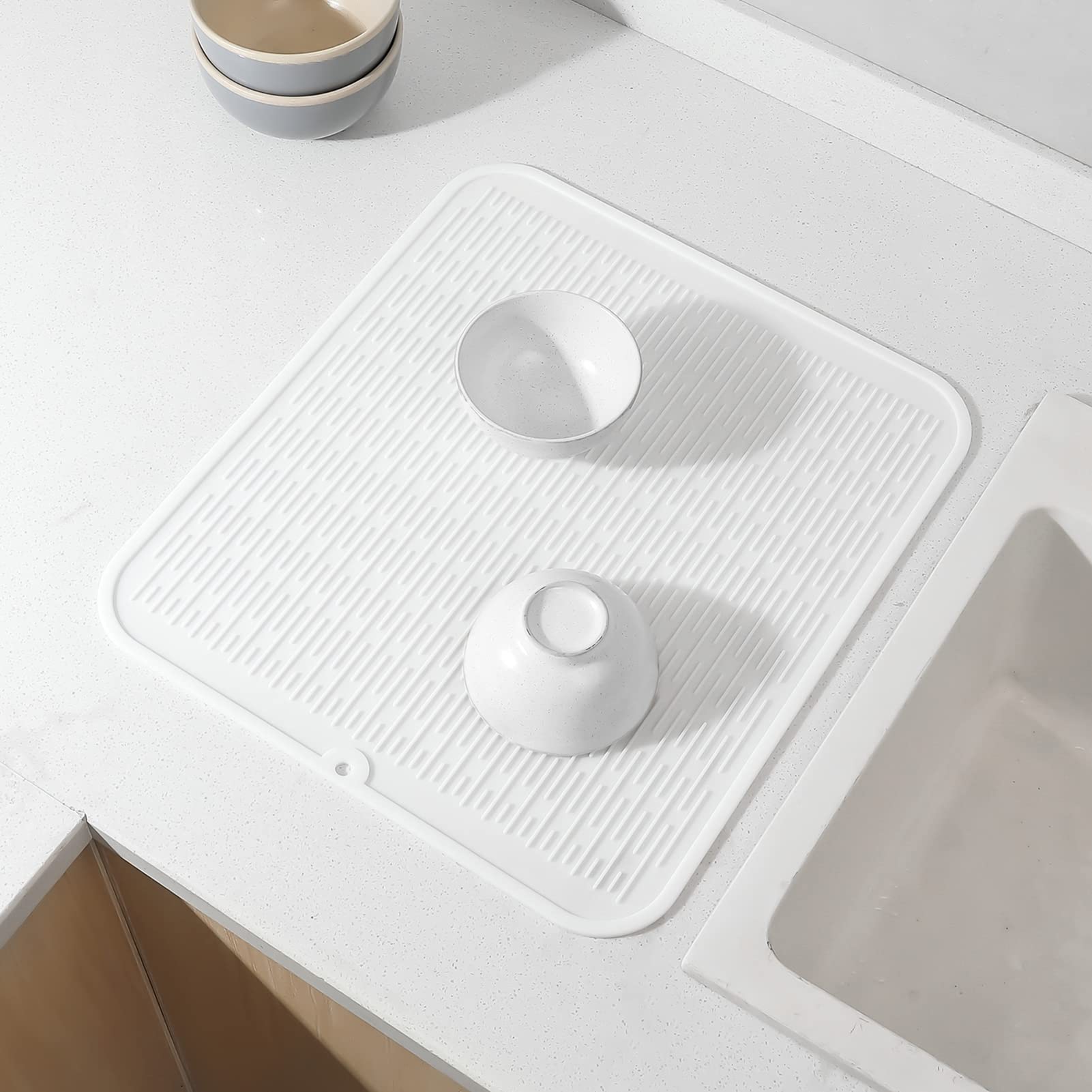 MicoYang silicone mat folds for space-saving storage.