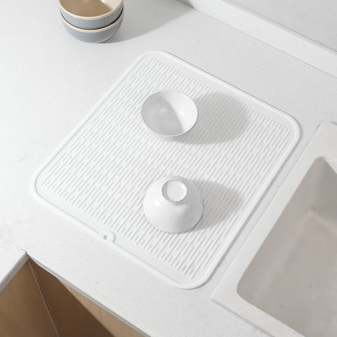 MicoYang silicone mat folds for space-saving storage.