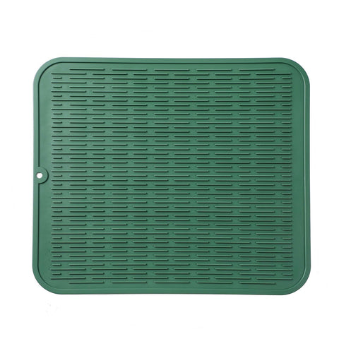 MicoYang silicone drying mat on kitchen counter offering a soft, non-slip drying surface.