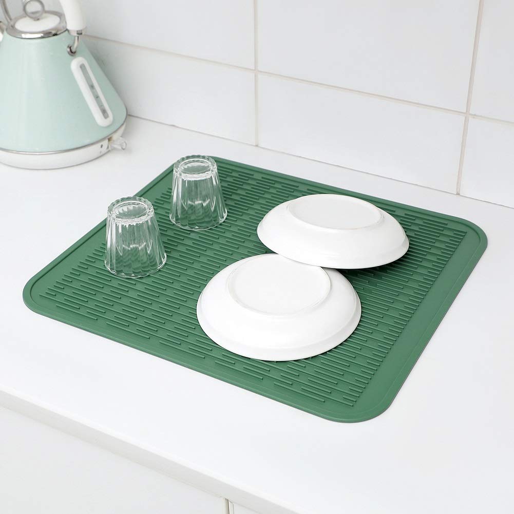 MicoYang silicone mat as a heatproof trivet for hot cookware.