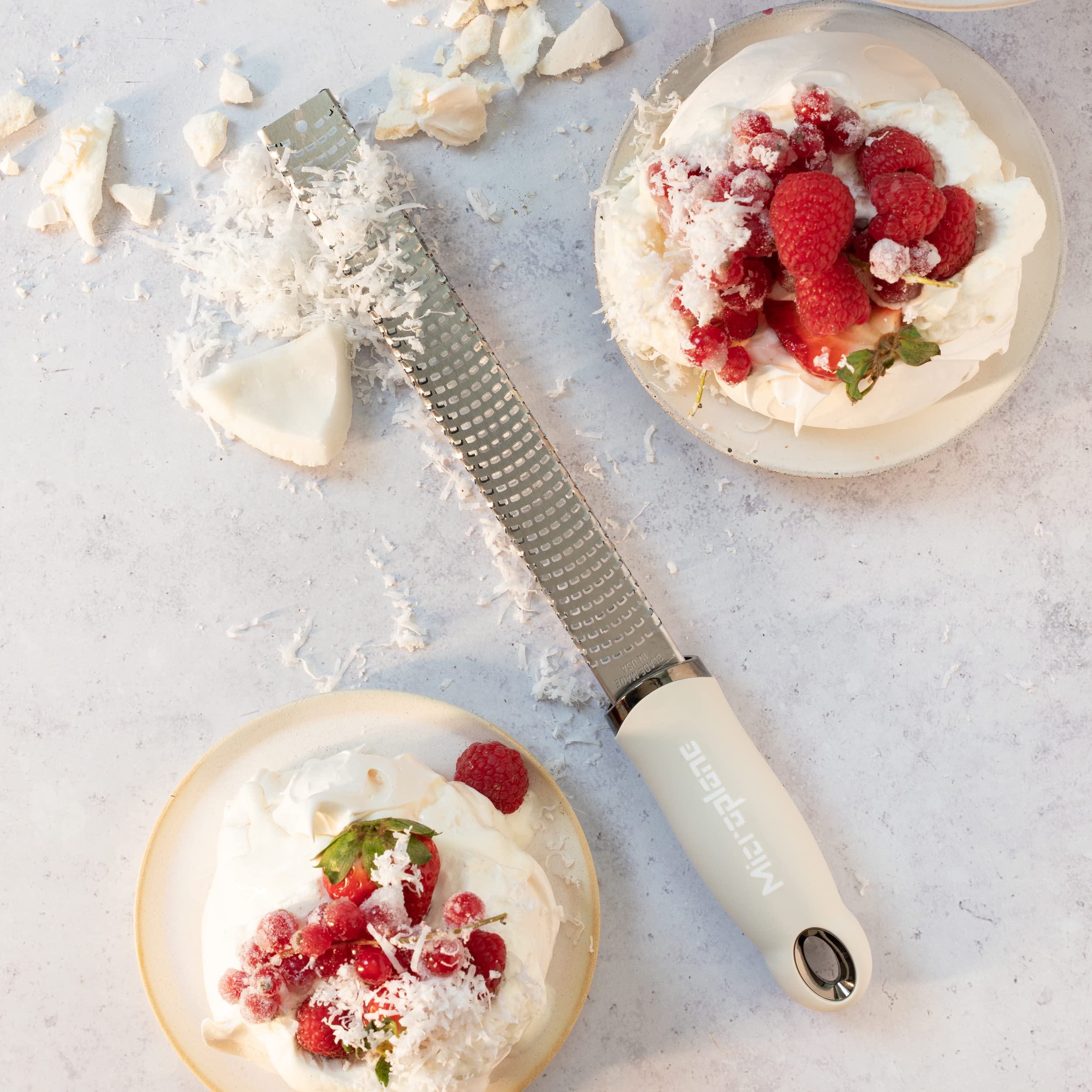 Microplane cashmere beige zester chocolate shavings enhance cocoa-based treats.