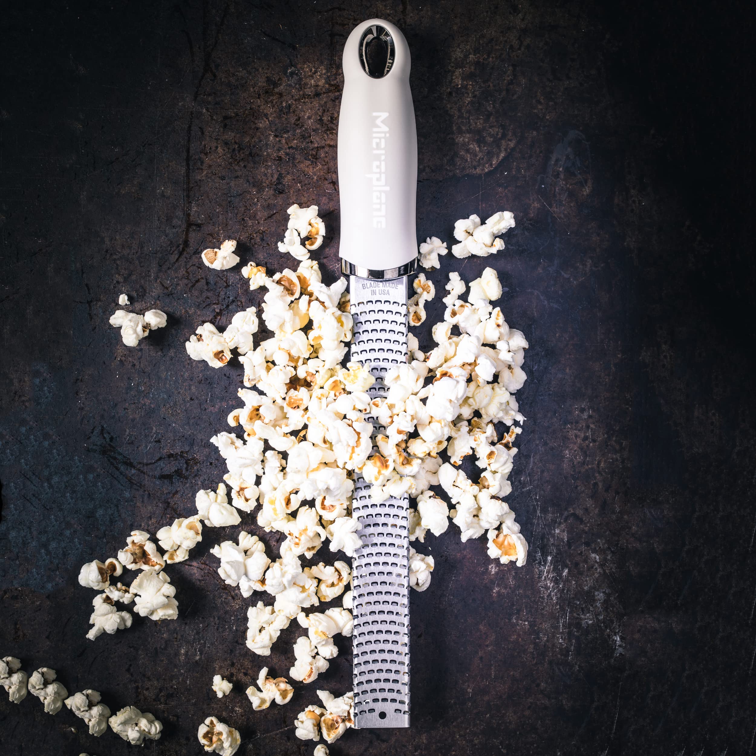 Microplane cashmere beige zester dishwasher safe for easy cleanup after cooking.