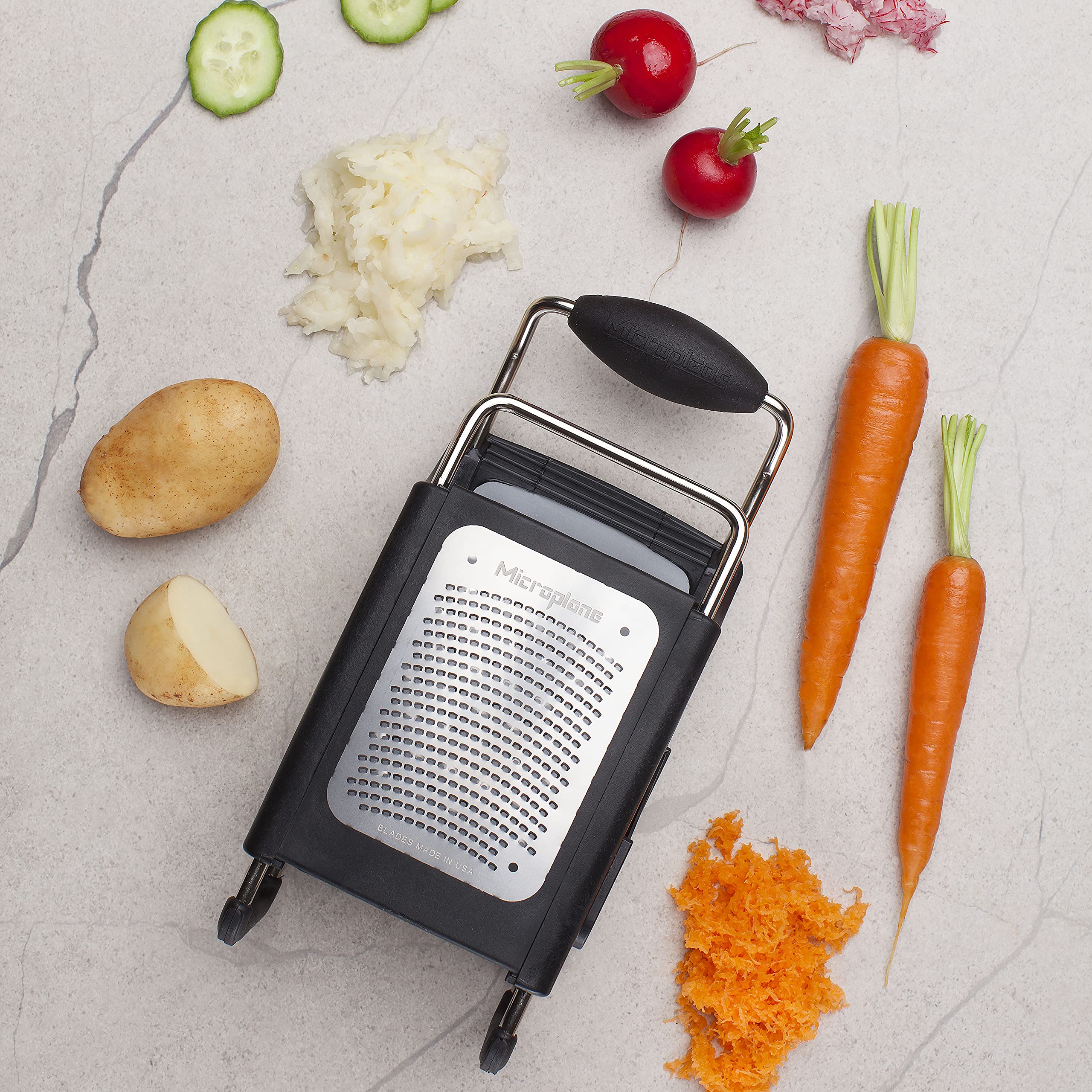 Non‑slip feet keep the grater steady on the counter
