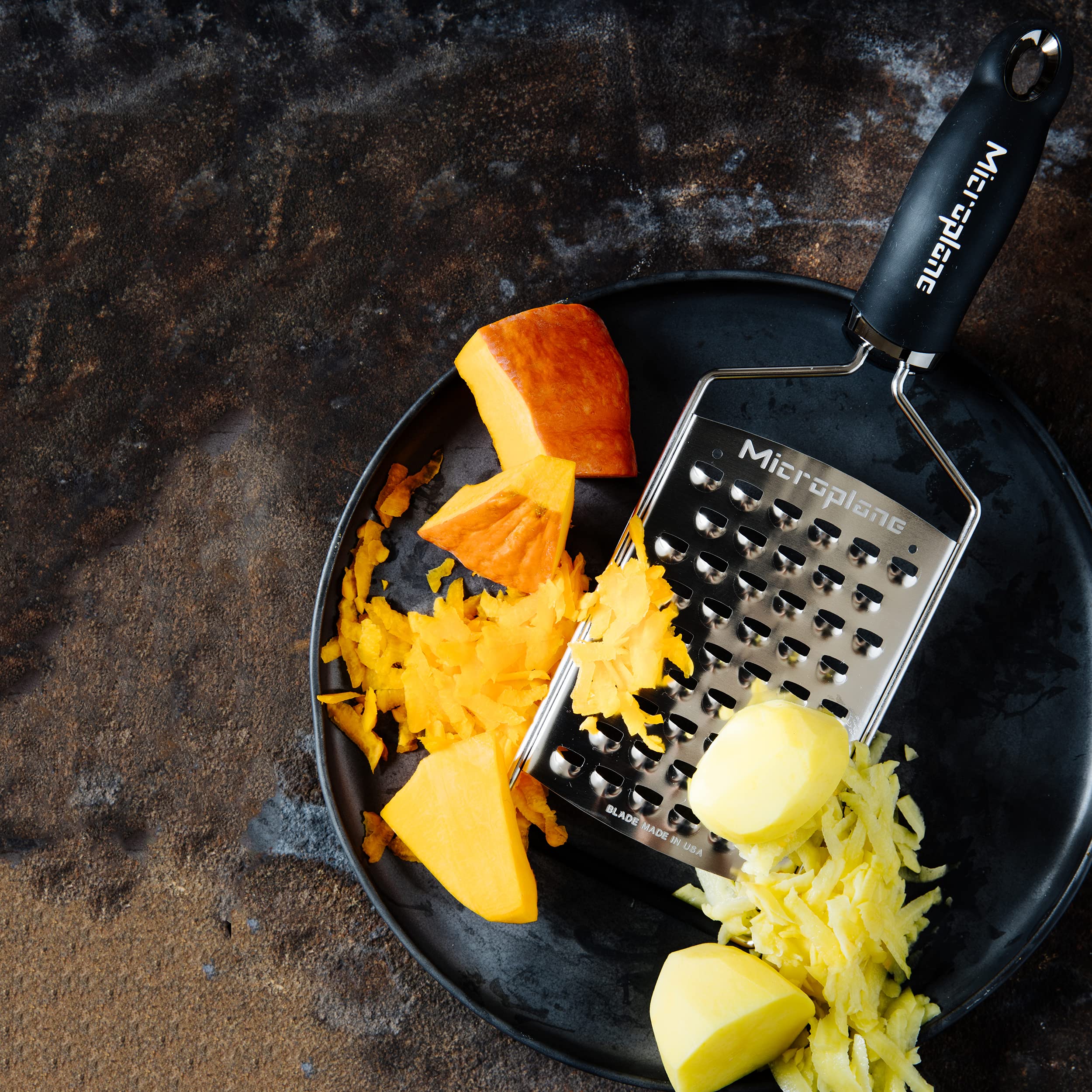 Microplane Gourmet Series shredding cheese, suitable for soft and hard varieties
