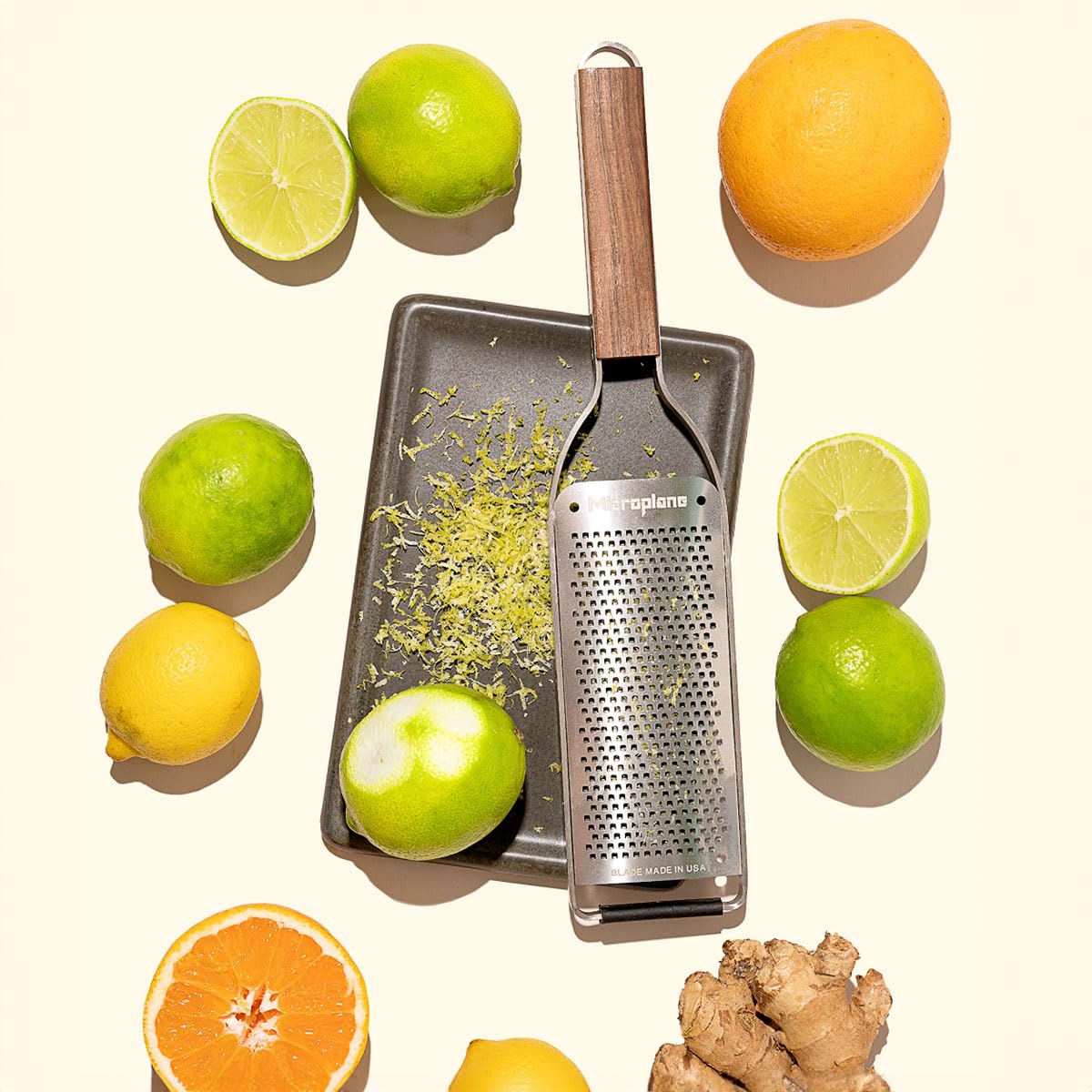 Microplane Master Series wood handle closeup showing fine blade for zest and spice grating.