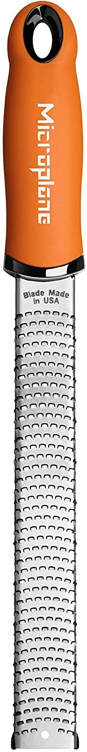 Microplane Premium Classic Zester Grater blade close-up showcasing surgical-grade stainless steel