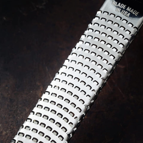 Microplane Premium Classic Zester Blue grinding whole spices.