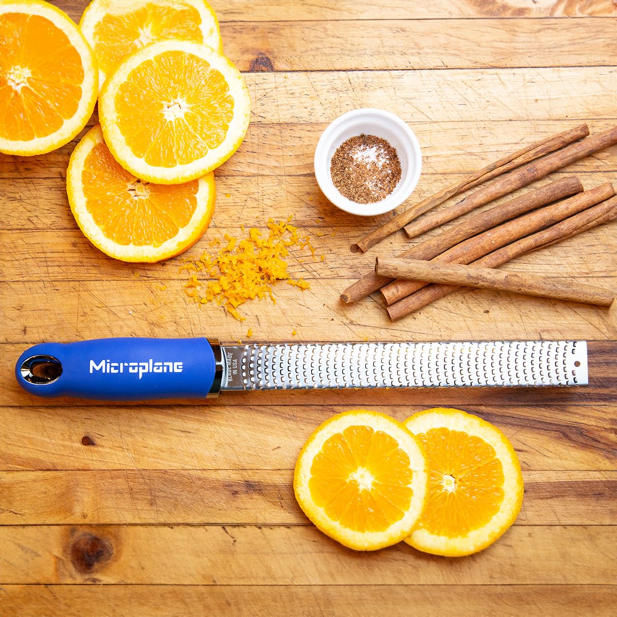 Microplane Premium Classic Zester Blue zesting citrus for bright flavor.