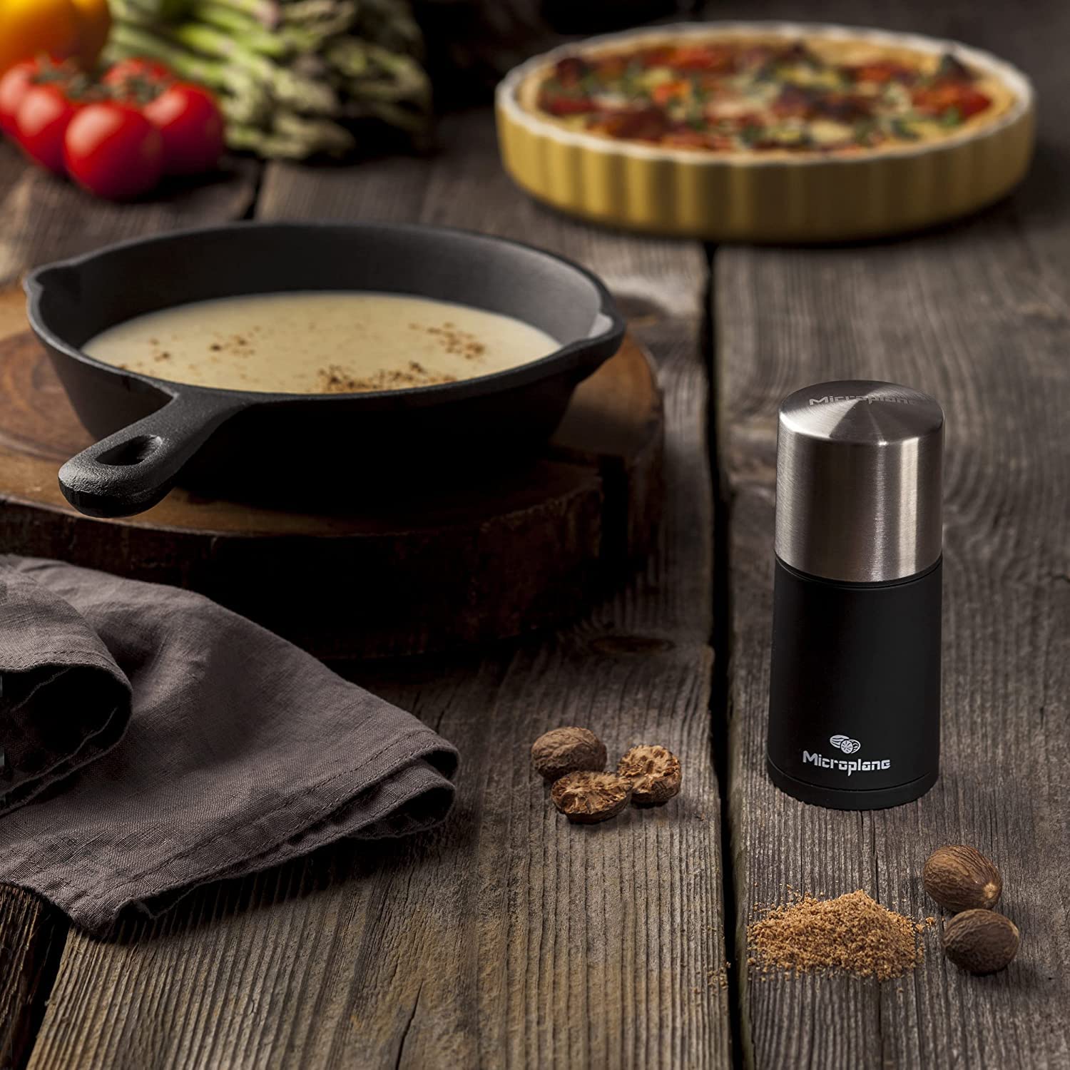 Microplane Spice Mill nutmeg grated for desserts and drinks.