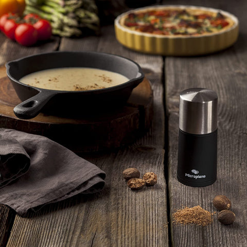 Microplane Spice Mill nutmeg grated for desserts and drinks.