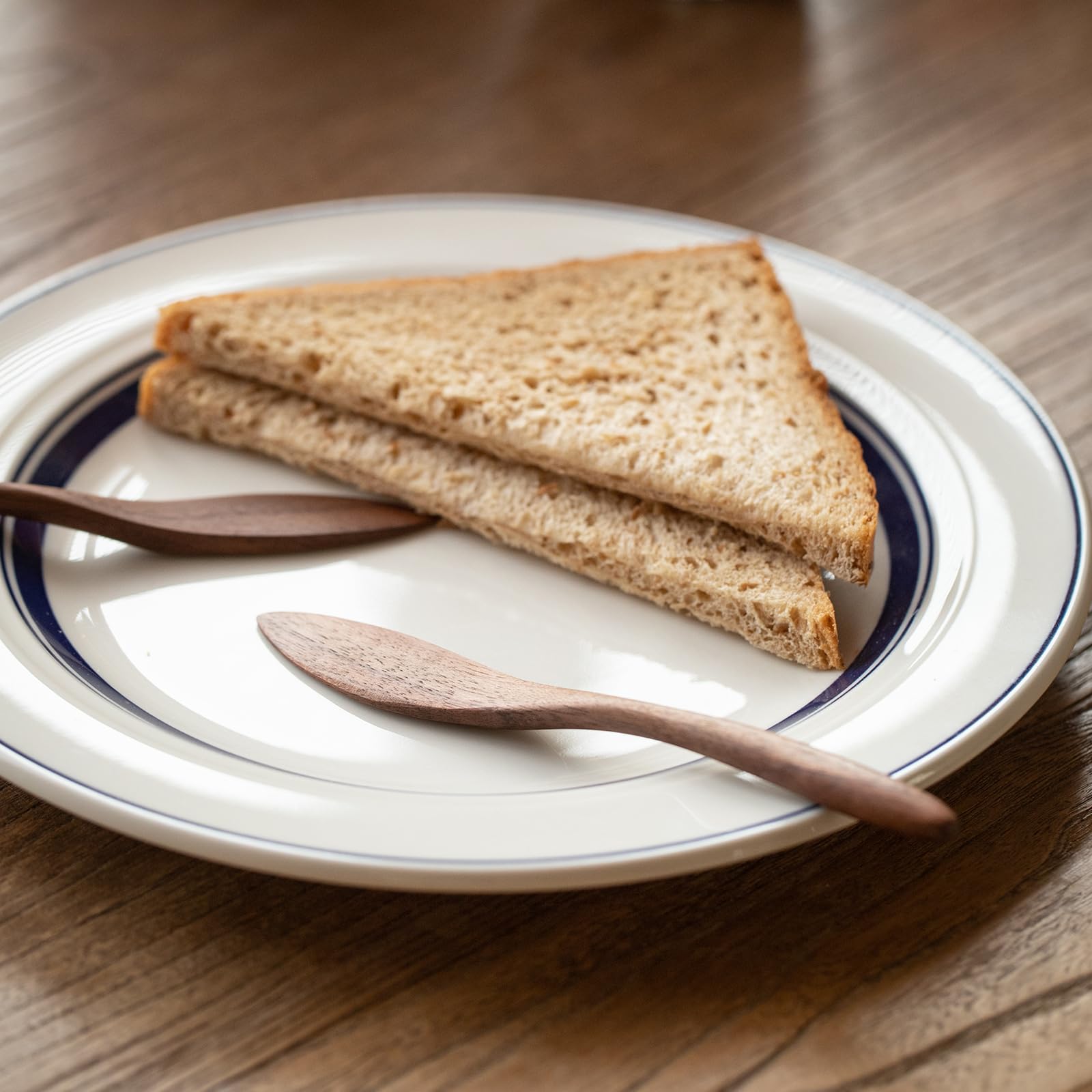 MIGAKU HOME set-of-4-butter-knives in wood showcases durable daily-use cutlery.