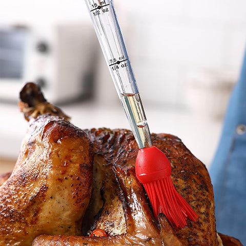 Mikim baster brush head attached for even sauce coverage on meat surfaces.