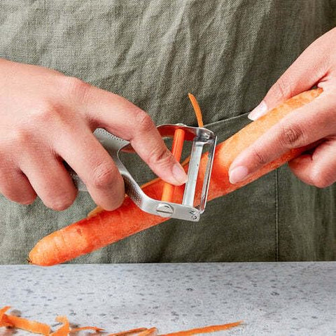 Milk Street Precision Peeler ergonomic handle fits small to large hands.
