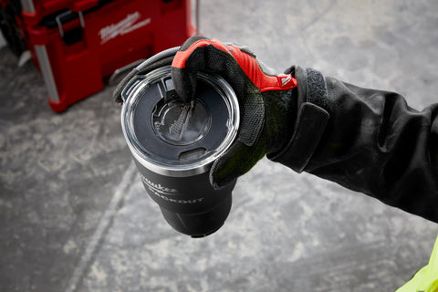 Milwaukee Packout insulated tumbler on a worksite demonstrates rugged practicality