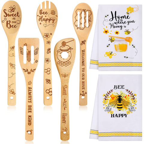 Minatee bee kitchen towels feature a playful pattern for drying dishes.
