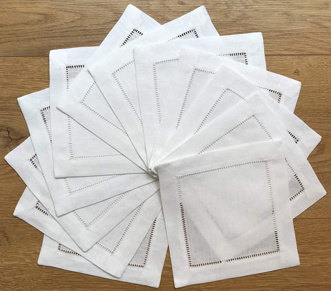 Minhcraft 50-pack cocktail napkins laid out for a table setting.