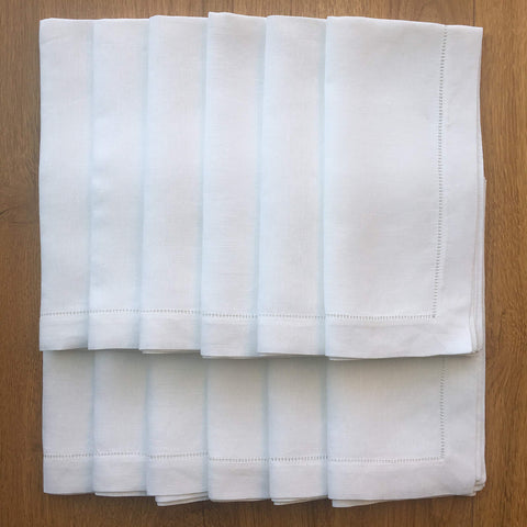 Minhcraft white linen napkins 20x20 displayed on a dining table