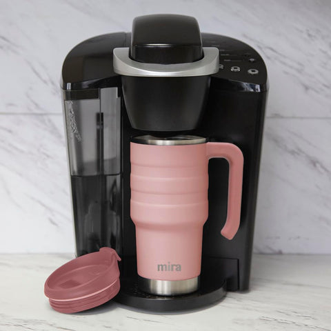 MIRA mug with ergonomic handle offers comfortable grip during commutes.
