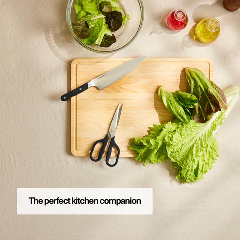 Misen heavy-duty kitchen shears blade close-up showing micro-serrated edge.