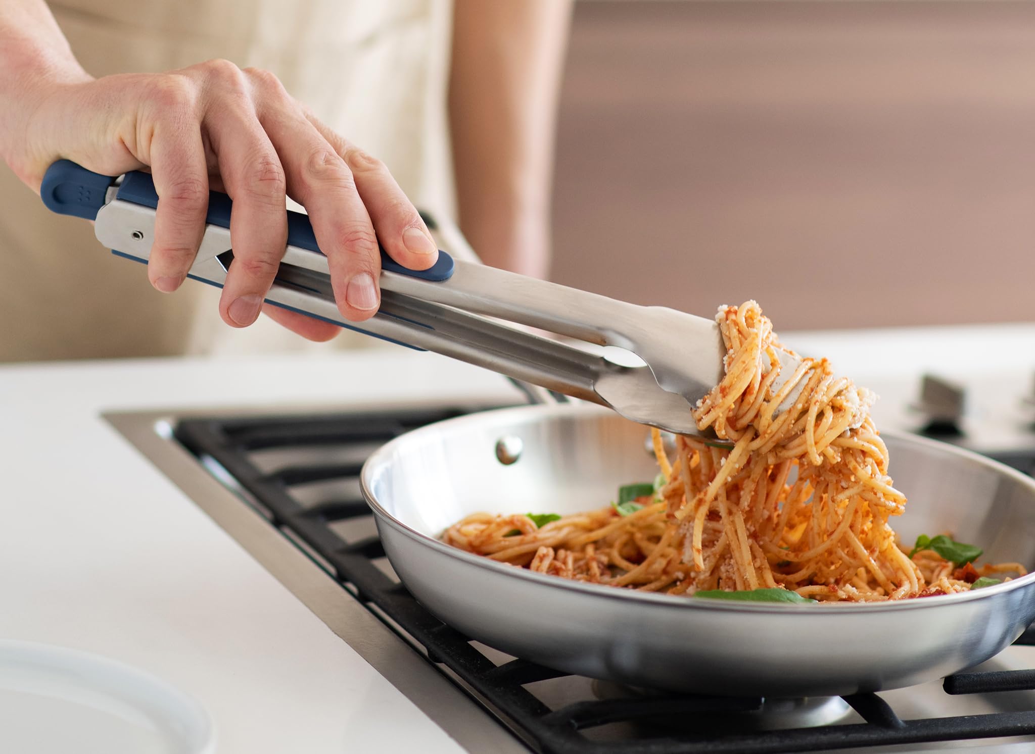 Misen silicone-tipped grip offers comfortable handling and precise control while cooking.