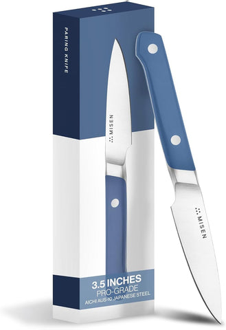 Misen paring knife blade close-up shows AUS-10 edge for precise peeling tasks.