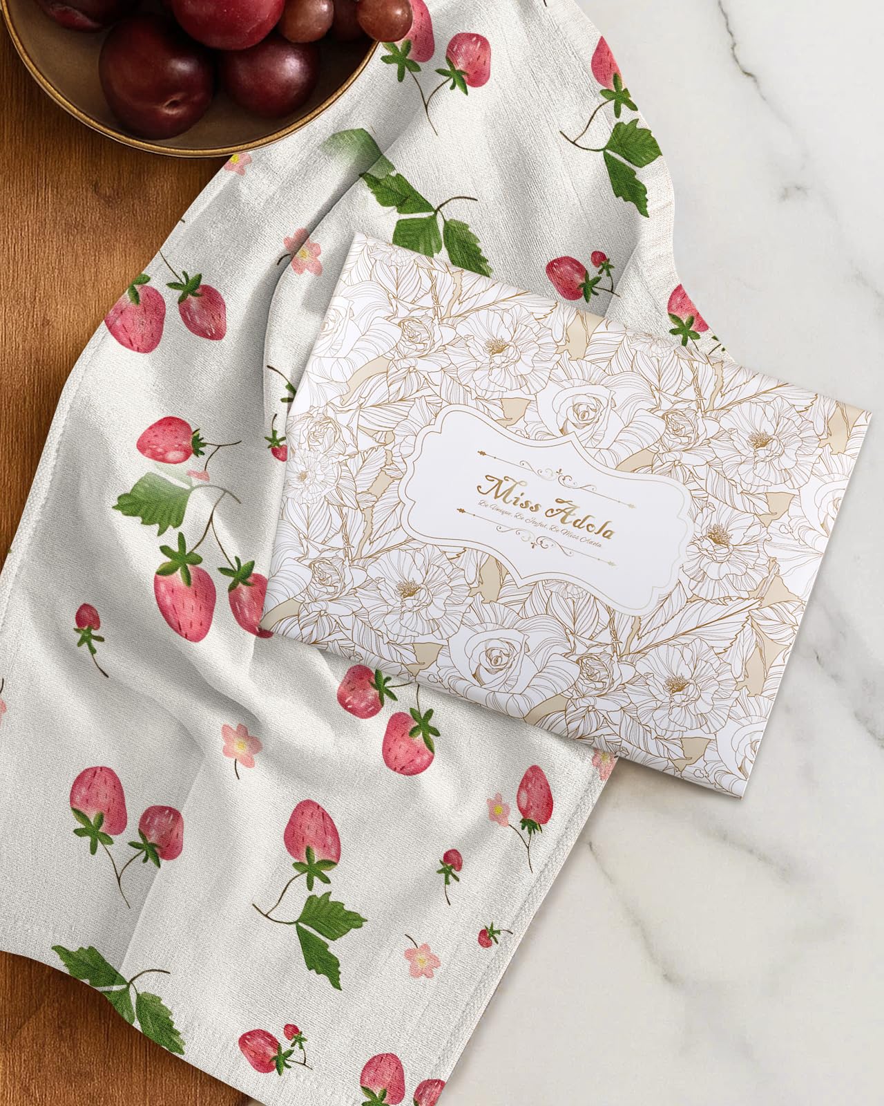Miss Adola decorative tea towels enhance home decor while drying surfaces.