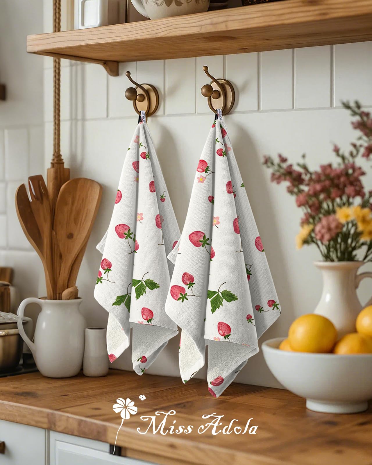 Miss Adola soft absorbent towels add decorative touch to any kitchen.