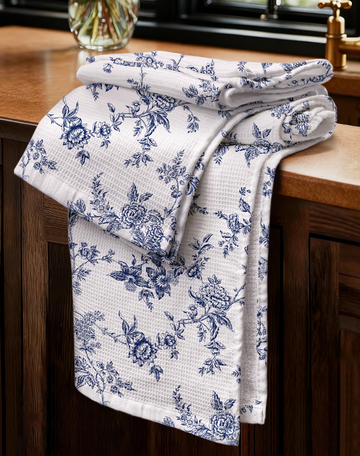 Miss Adola waffle towels with a white blue flower pattern for stylish kitchen decor