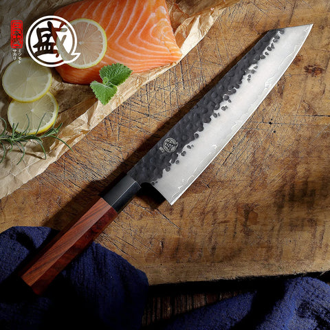 MITSUMOTO SAKARI Kiritsuke hand forged process reveals craftsmanship and durable construction.