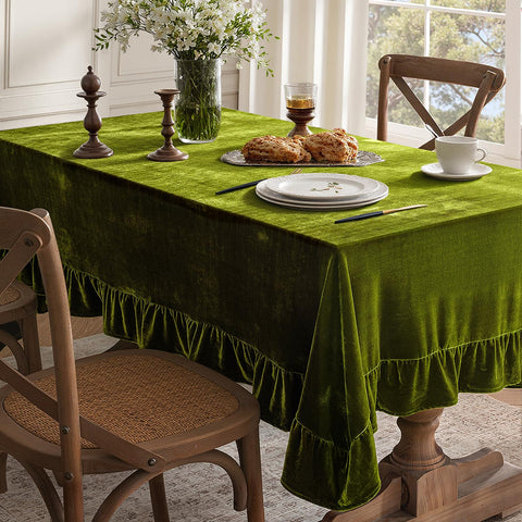 Draped MIULEE velvet tablecloth in olive green over a dining table