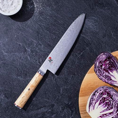 Miyabi Birchwood SG2 8-inch edge close-up highlights razor-like sharpness.