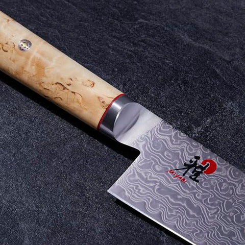 Miyabi Birchwood SG2 8-inch handle close-up shows Karelian Birch comfort.