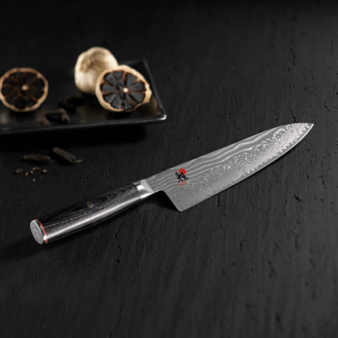 MIYABI Kaizen II with 48-layer Damascus pattern boosts beauty and edge retention.