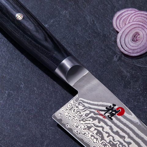 MIYABI Kaizen II D-shaped pakkawood handle offers comfortable grip.