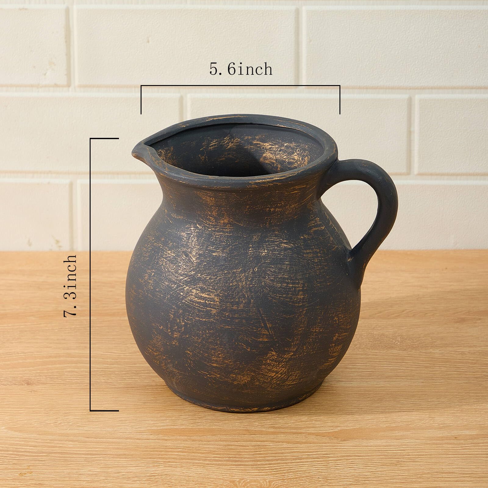 MIYUKI large-opening ceramic crock keeps spoons, whisks, and knives within easy reach.