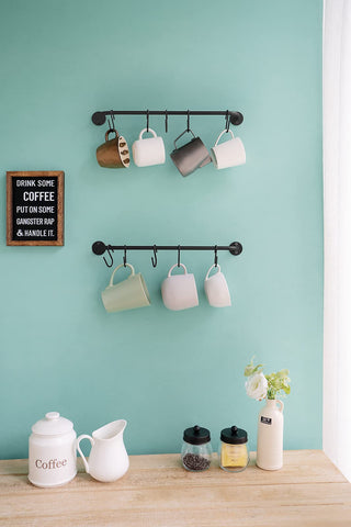 Mkono mug rack close-up showing sturdy S-hooks and durable metal that hold mugs securely.