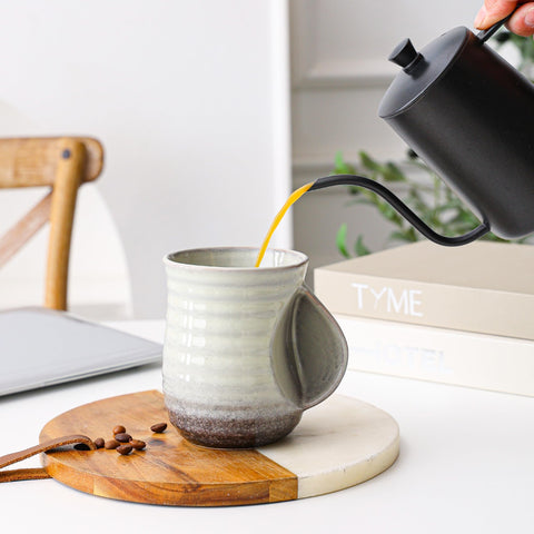 Mkour microwave-safe ceramic mug ready for quick reheating