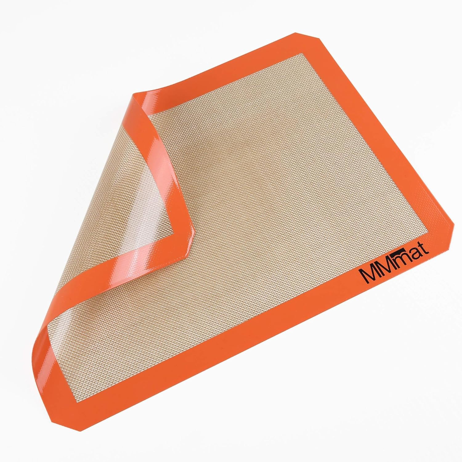 MMMAT silicone baking mat being cleaned in dishwasher for easy maintenance.