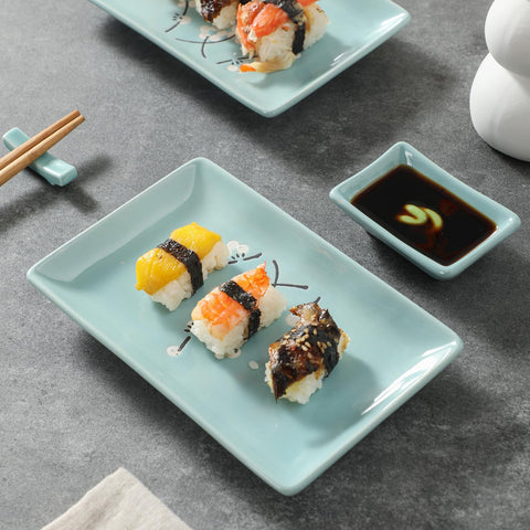 Ceramic sushi plates and rectangular tray by Mocerakai for modern presentation