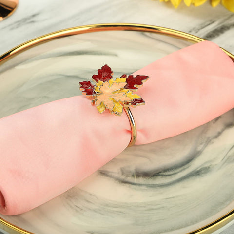 Mokylor maple leaf napkin ring on dining table enhancing harvest decor.